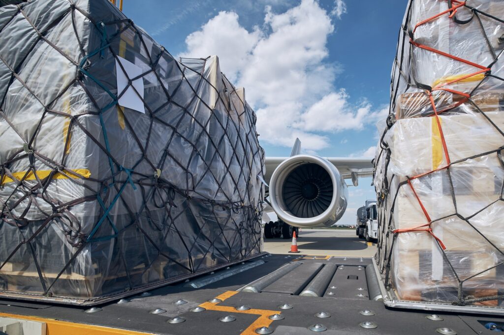 Loading of cargo containers to airplane